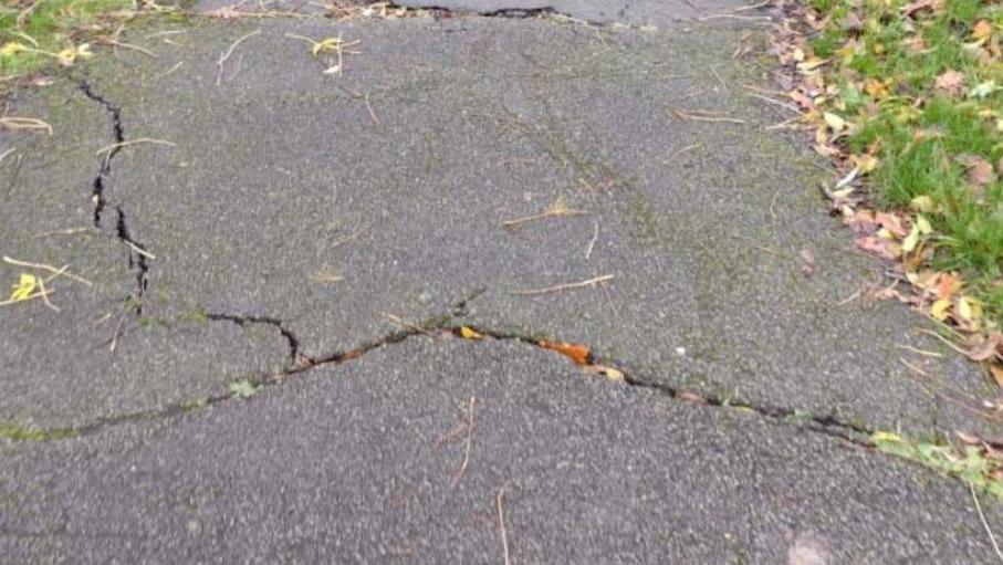 Damaged path in Europa Avenue, West Bromwich