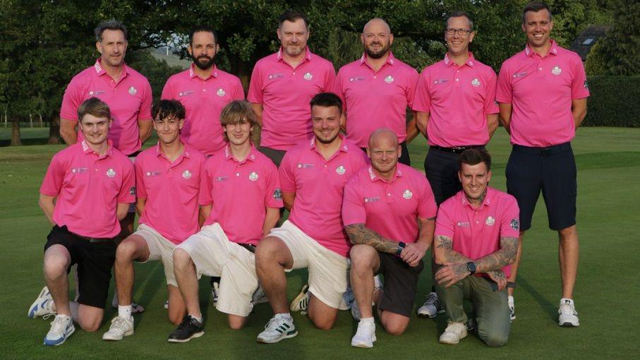 Harry and Freddie pictured in a team photo of all the other male members they will play with on Friday, wearing pink t-shirts and shorts and trainers, in the middle of what appears to be a golf field.