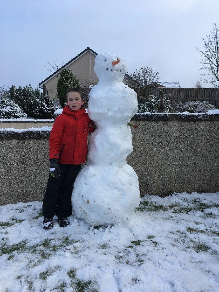 boy-with-snowman.