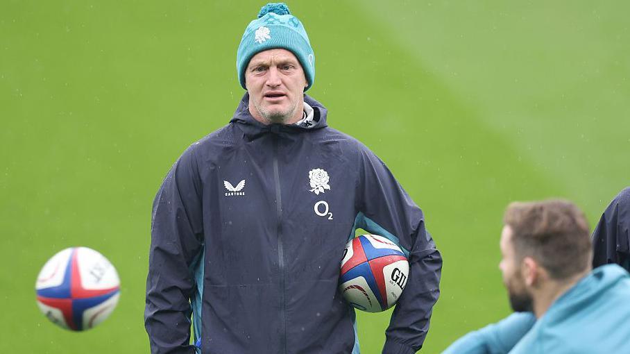 England attack coach Lee Blackett watches on during a training session