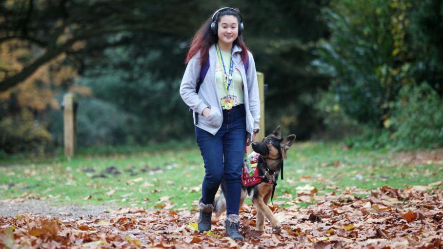 Melody Chen and her assistance dog Mia