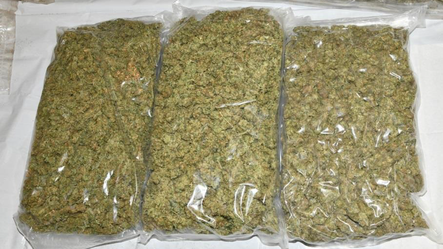 Three reasonable sized clear bags of cannabis, photographed by investigators.