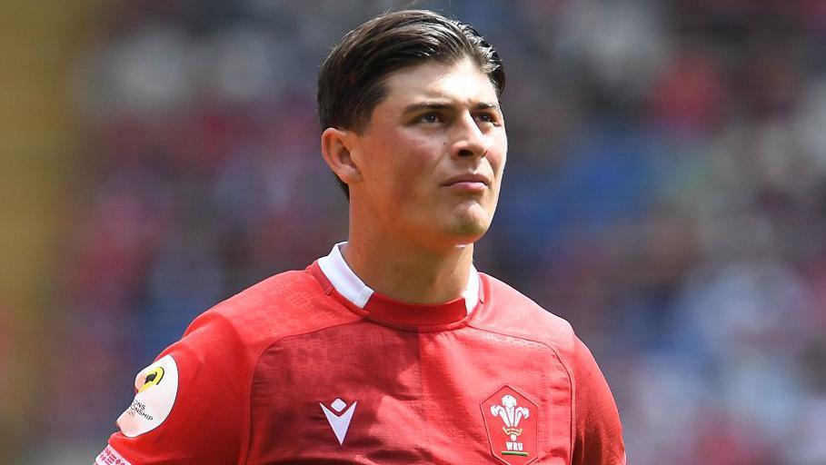 Louis Rees-Zammit looks pensive during Wales game against Fiji