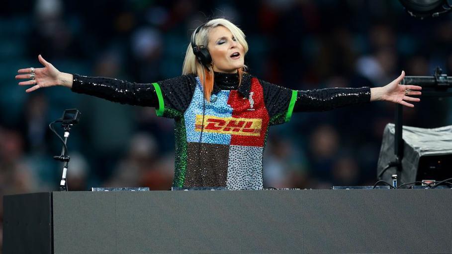 Faithless' Sister Bliss wears a diamante-studded Harlequins shirt