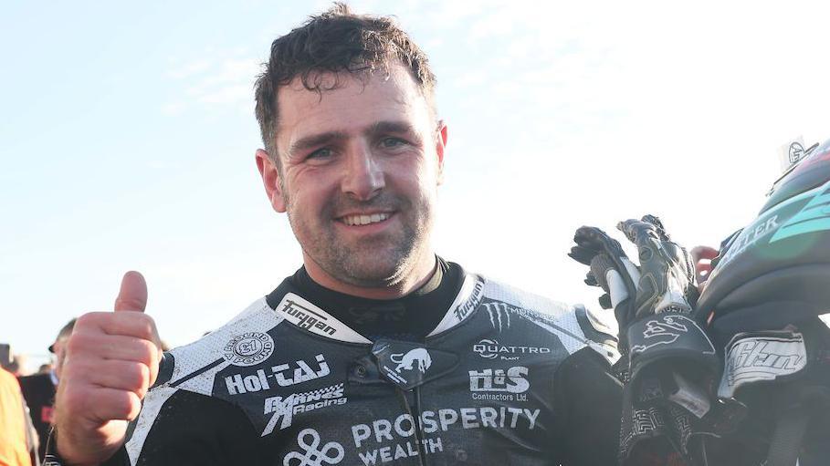 Michael Dunlop celebrates one of his two race wins on Thursday night