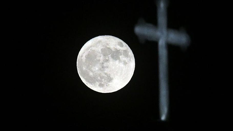 A blue moon rises over the Church of St. John the Baptist in Skopje on May 31, 2026. 