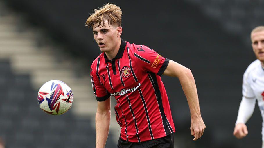 Nathan Lowe playing for Walsall against MK Dons