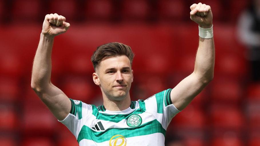 Kieran Tierney salutes Celtic supporters at Pittodrie on 10 August