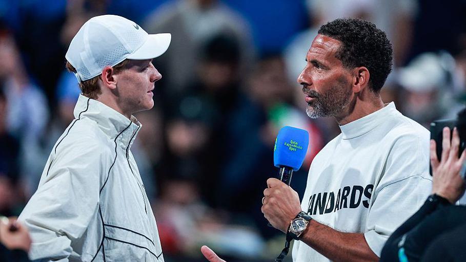 Jannik Sinner being interviewed by Rio Ferdinand after beating Tomas Machac at the Qatar Open