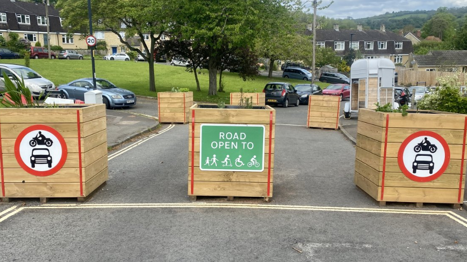 Planters blocking a road in a low traffic neighbourhood