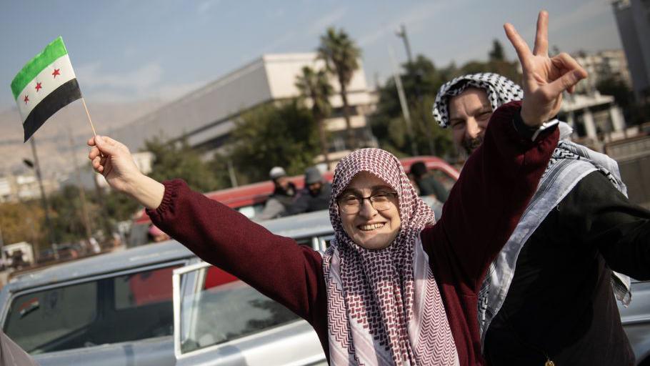 people in damascus celebrating in the streets