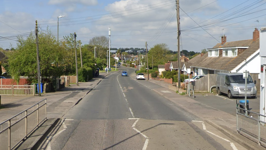 A Google Street image of a quiet road with homes either side.