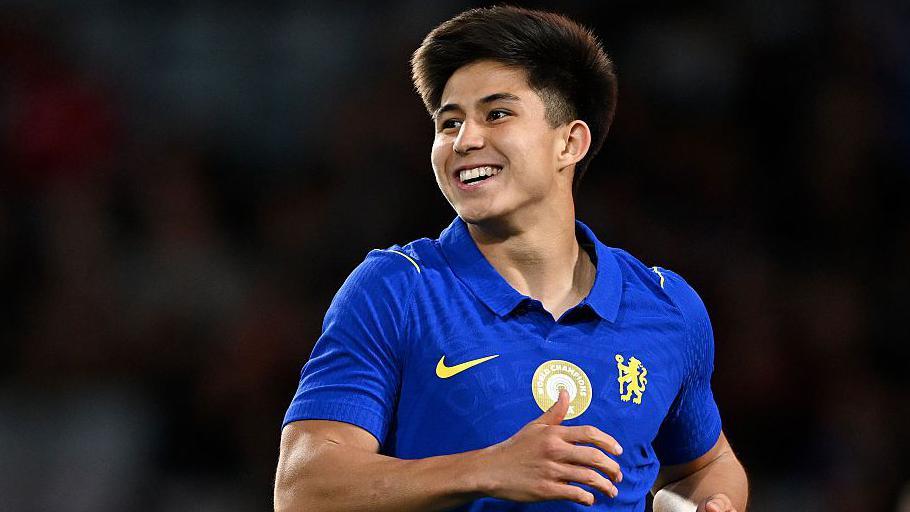 Dastan Satpaev celebrates after scoring 