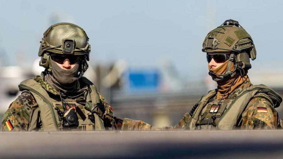 Soldiers from the naval battalion are pictured during a visit of the German Defence Minister of the first submarine squadron and the naval battalion at the naval base in Eckernfoerde, northern Germany on July 19, 2024