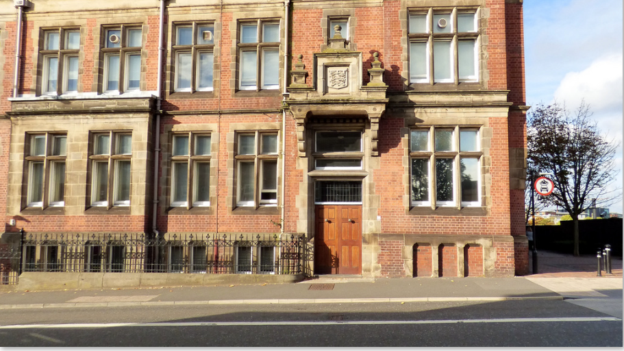 An image of the red brick Preston County Hall