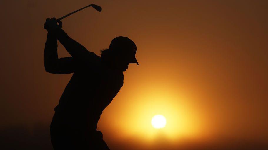 Tommy Fleetwood of Team Great Britain & Ireland warms up on the range prior to the foursomes matches on day two of the Team Cup at Abu Dhabi Golf Resort in Abu Dhabi, United Arab Emirates