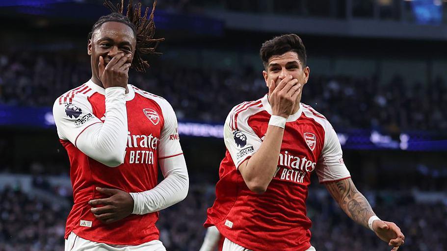 Eberechi Eze celebrates with Piero Hincapie after putting Arsenal ahead at Spurs.