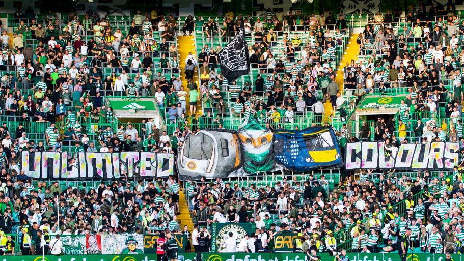 Fans in the standing section at Celtic Park