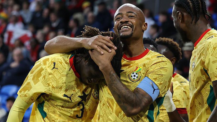 Jordan Ayew (right) congratulates Caleb Yirenkyi on his goal for Ghana