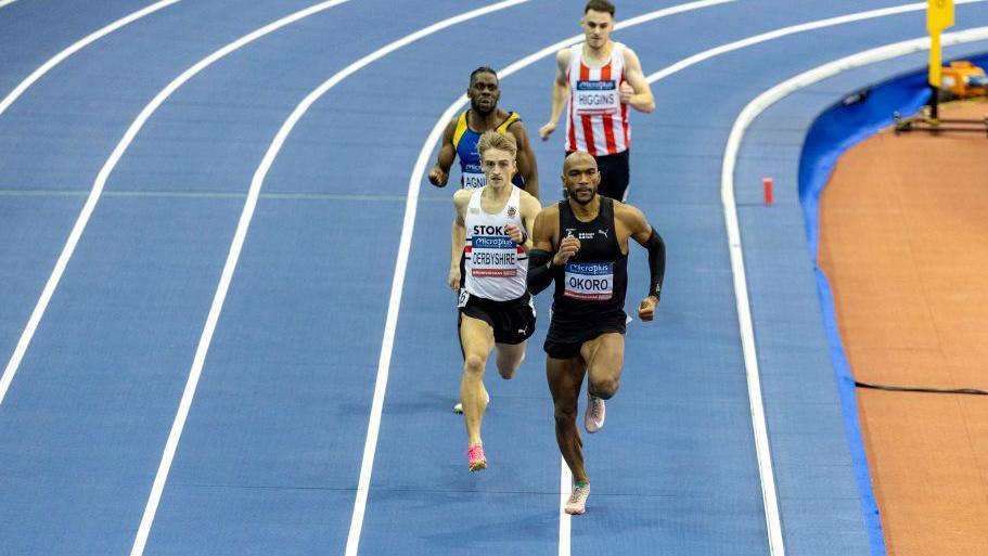 Seamus Derbyshire is in second place as he moves off the bend and into the home straight in the 400m at the UK Championships in February