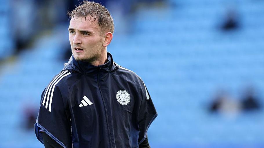 Leicester City goalkeeper Jakub Stolarczyk looks to the side during the Foxes' pre-match warm-up against Blackburn Rovers