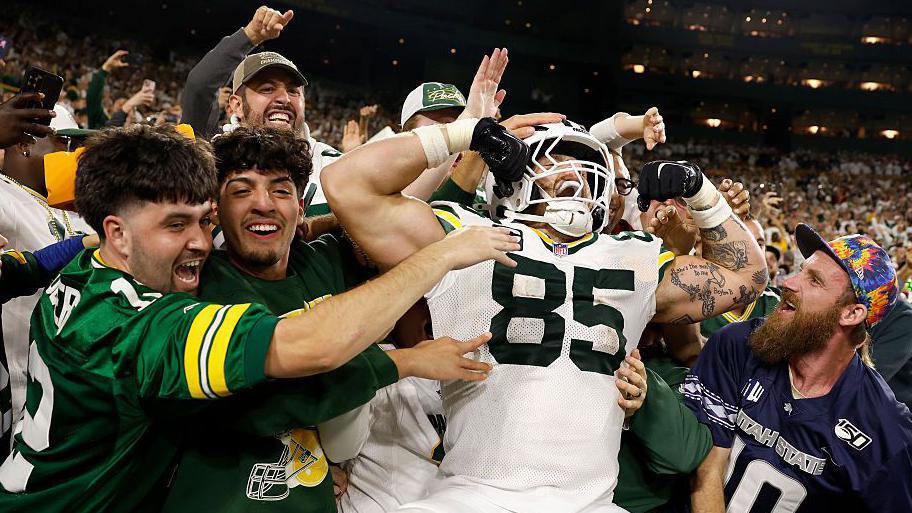 Tucker Kraft of nan Green Bay Packers celebrates pinch fans aft scoring a touchdown against nan Washington Commanders