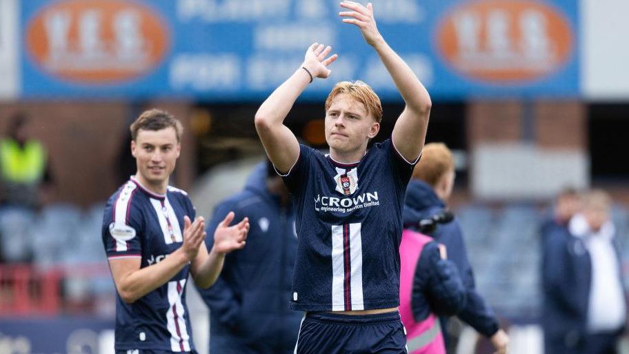 Luke Graham applauds Dundee fans at Dens Park