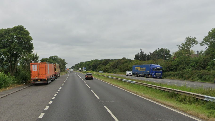 Google Street View image of the A1 in Nottinghamshire showing cars and lorries on either side of the road