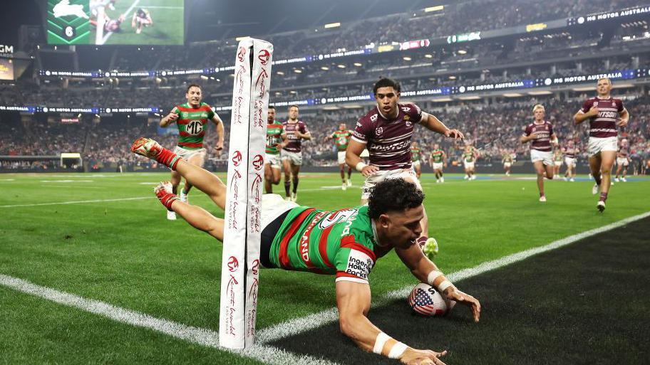 Jacob Gagai of the South Sydney Rabbitohs scores a try against the Manly Sea Eagles in Las Vegas