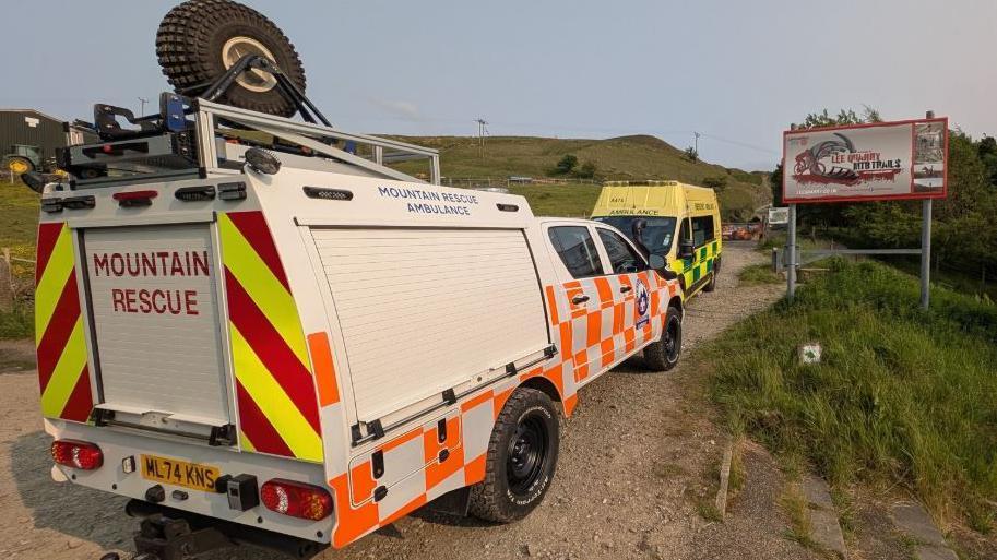 Mountain Rescue and ambulance vehicle at the entrance to Lee Quarry in Bacup.