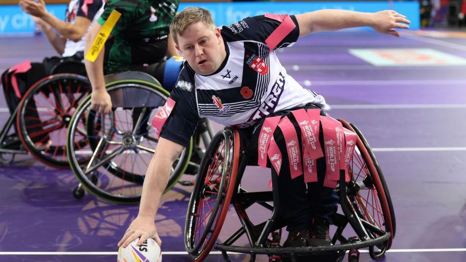 Adam Rigby goes over for a try for England during the 2021 World Cup