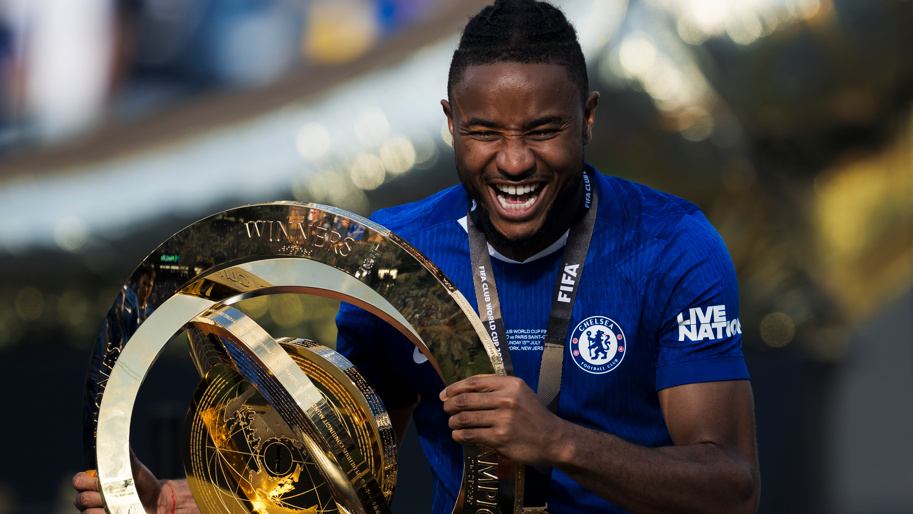 Chelsea's Christopher Nkunku poses with the Fifa Club World Cup trophy after his side's win over Paris St-Germain in the final