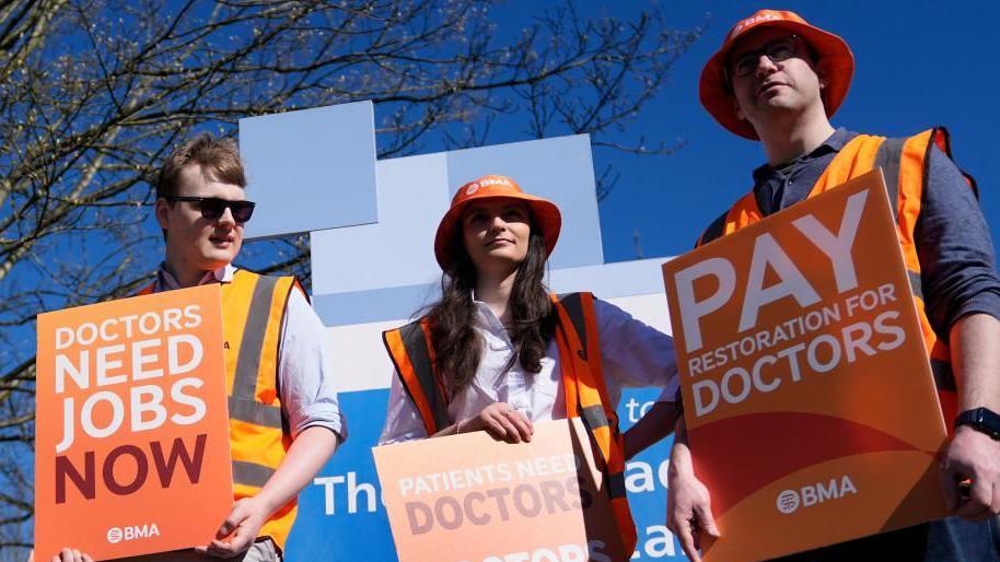 Members of the British Medical Association (BMA) on the picket line outside John Radcliffe Hospital in Oxford