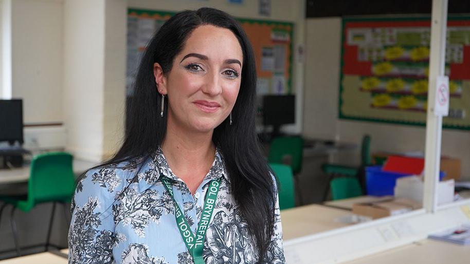 Jennifer Hughes stood in her classroom