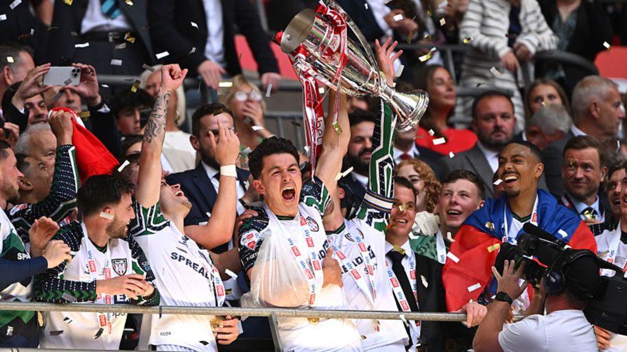 Sunderland players celebrate their promotion to the Premier League