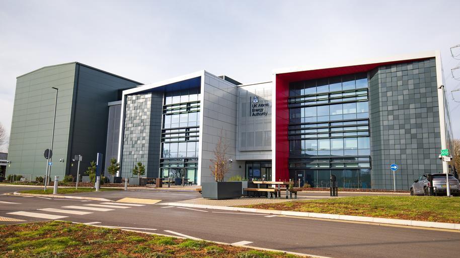 The United Kingdom Atomic Energy Authority (UKAEA) building in Culham It appears very modern and has a couple of large glass fronts.