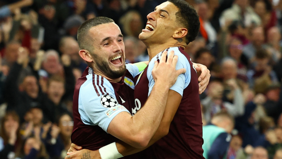 Aston Villa's players celebrate during their team's Champions League game with Bologna