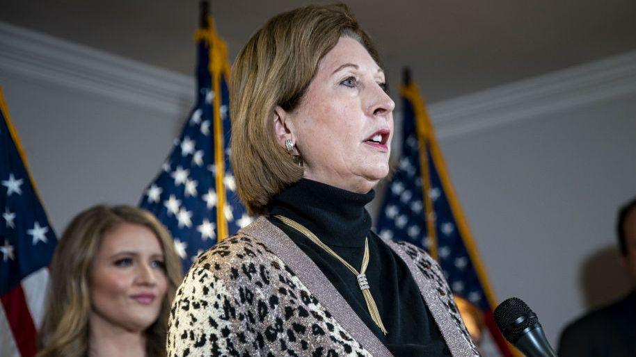 Sidney Powell (centre) and Jenna Ellis (background left)