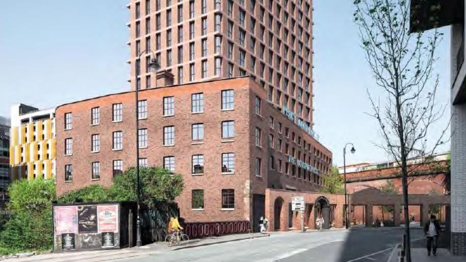 A 2018 computer generated image shows the red-brick, six-storey Hotspur Press building with a large red-brick tower block rising from inside it. The railway viaduct can be seen in the background.