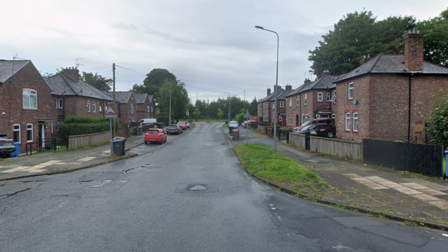 A Google view of South Radford Street in Salford, with red brick semi-detached houses