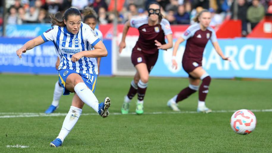 Fran Kirby scores a penalty for Brighton against Aston Villa in their Women's Super League game