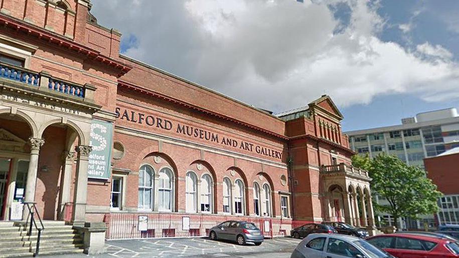 External view of the front of Salford Museum and Art Gallery on a cloudy day 