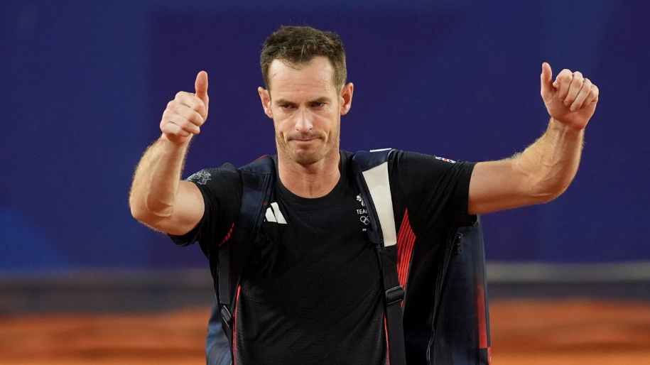 Andy Murray acknowledges the crowd after his defeat in the men's doubles