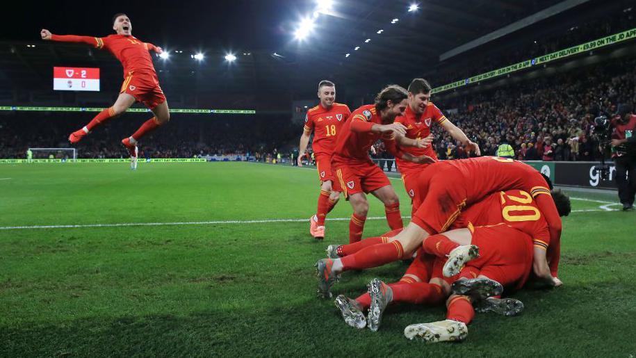 Wales players celebrate Aaron Ramsey's second goal in the 2-0 win over Hungary in 2019