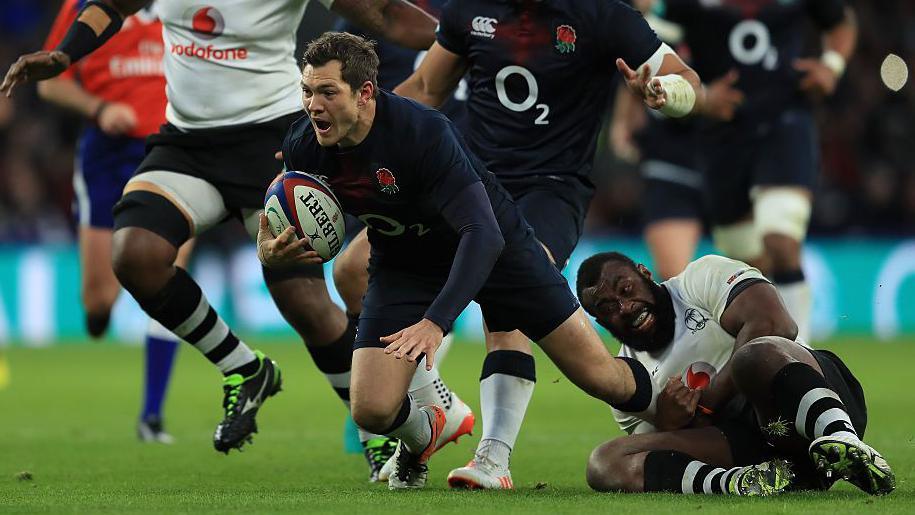 Alex Goode scores a try in England's 58-15 win against Fiji at Twickenham in November 2016