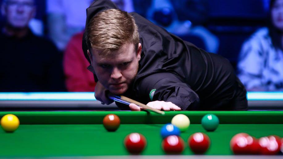 Aaron Hill lines up a shot from the baulk area