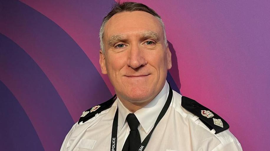 Paul Joyce, commander of policing for Coventry, stands looking the camera.