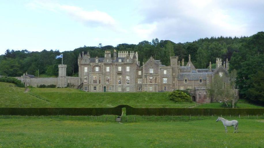 Abbotsford House with a horse in the foreground