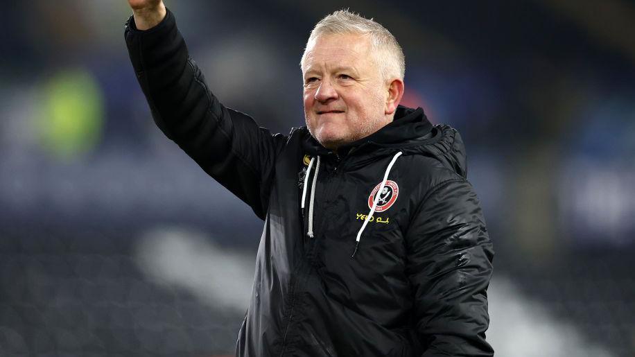 Chris Wilder gives a thumbs up to the fans after Sheffield United's win at Swansea City.