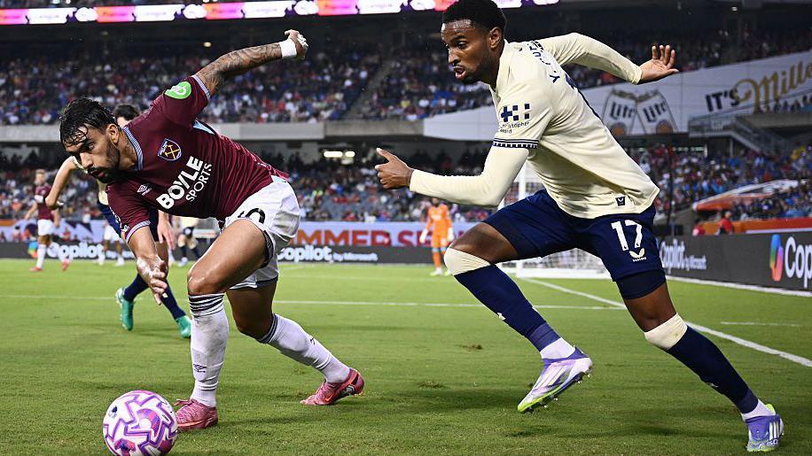 West Ham United's Lucas Paqueta and Youssef Chermiti successful action for Everton